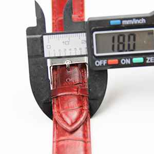Measuring a leather watch strap with a caliper